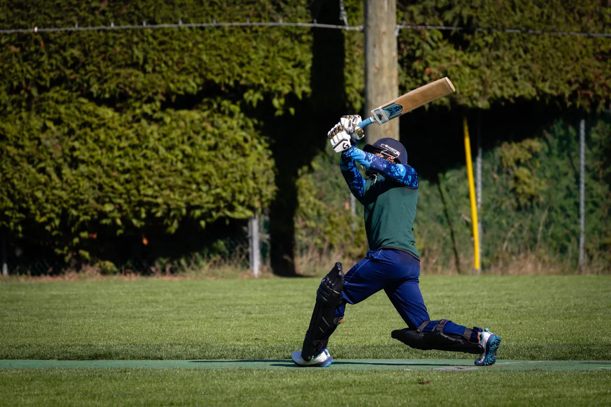 Cricket player batting